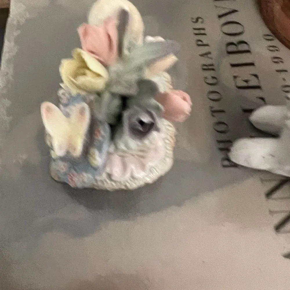 Set of two vintage small ceramic white and floral cats.